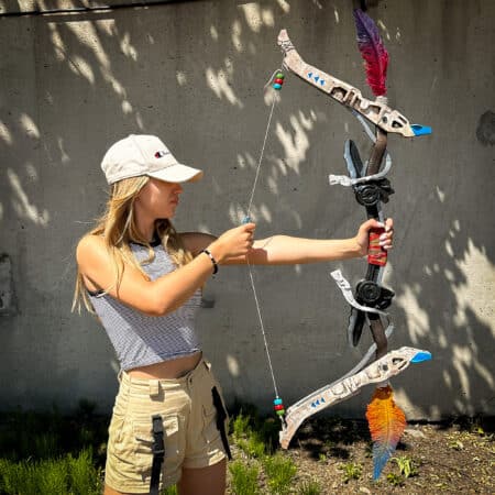 Stunning replica of Aloy's Bow from Horizon, handcrafted and hand-painted by artists, shipped in two pieces for safe delivery.