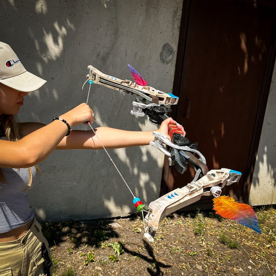 Stunning replica of Aloy's Bow from Horizon, handcrafted and hand-painted by artists, shipped in two pieces for safe delivery.