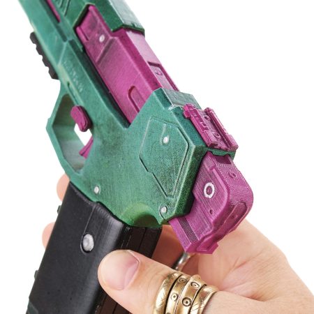Rebecca`s pistol green and pink replica prop from Cyberpunk 2077 by Blasters4Masters