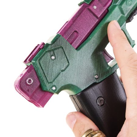 Rebecca`s pistol green and pink replica prop from Cyberpunk 2077 by Blasters4Masters